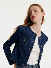 a lady in dark blue denim jacket with white T-shirt
